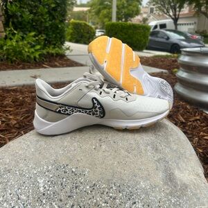 Nike Cream and Gold Sneakers with Leopard Swoosh